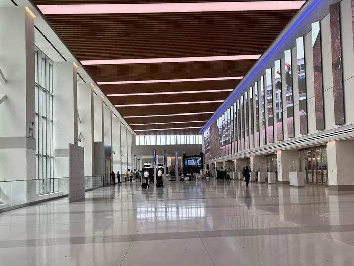 After touring the check-in area, media climbed one level to the security checkpoint.