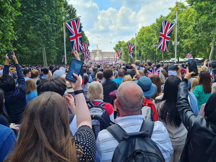 After the parade was over, the barriers were removed and the public were invited to watch a flyover with the Queen and the royal family, who looked on from the palace balcony.