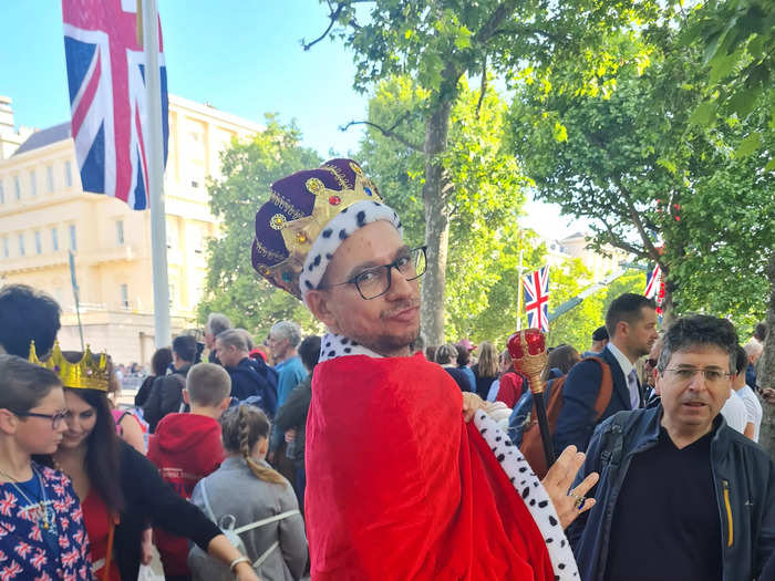 Some people were decked out in full costume, like this royal fan who wore a crown and a cape.