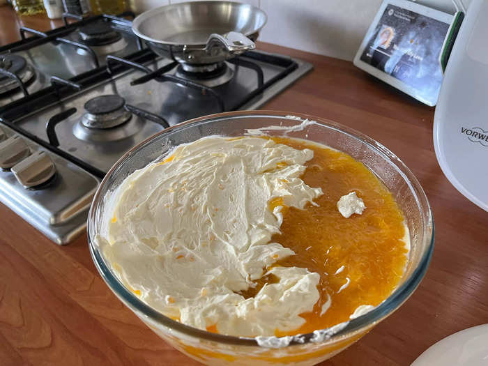 Once at soft peaks, start to spread the mixture over the top of the coulis as the final layer to the trifle.