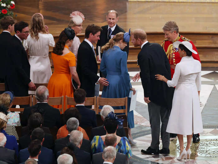 Princess Eugenie, her husband Edoardo Mapelli Mozzi, and Princes Beatrice made room for Markle and Harry as they arrived at their seats.