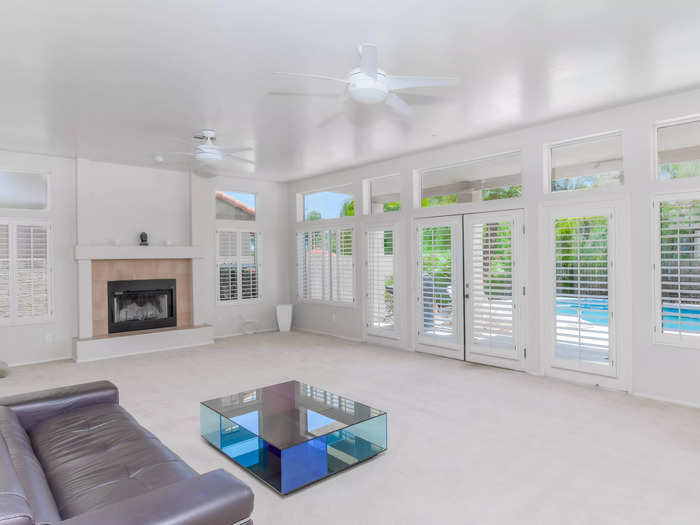 Aside from the golf green, the house has a mix of tile and carpet flooring as well as plenty of natural light, according to the same source.