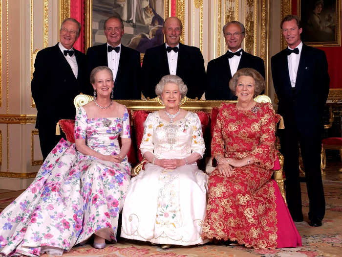 Her Majesty mingled with other European monarchs on June 17, 2002, in a white gown with floral embellishments.