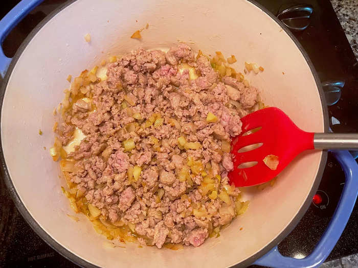 Then I added the sausages to my Dutch oven.