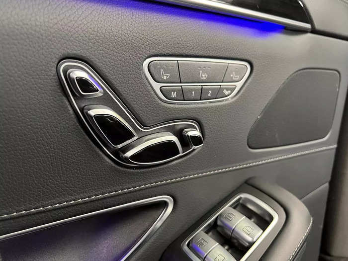 The controls to your seat are located on the door, and you can also control the solar blinds.