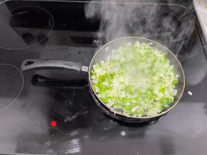 Next, take all the chopped ingredients and add them to the skillet.