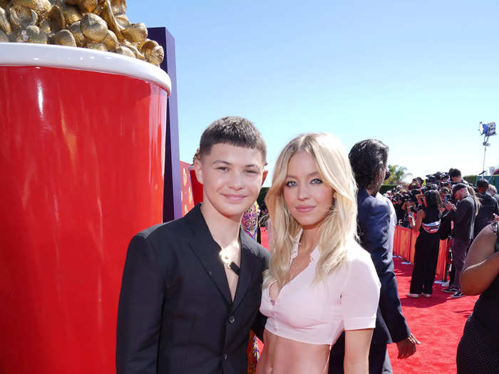 Sydney Sweeney wore a "Euphoria"-esque outfit as she posed with costar Javon Walton on the red carpet.