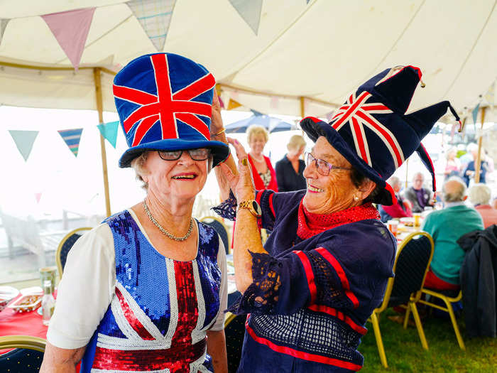 Members of the Royal Cornwall Yacht Club and their neighbors also sported festive hats and added some sparkle to their ensembles.