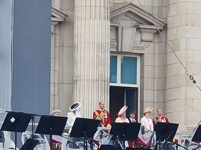 The royal family watched from the balcony. My view of them was partly obstructed since a stage was being built for the Platinum Party concert, due to take place later that weekend.