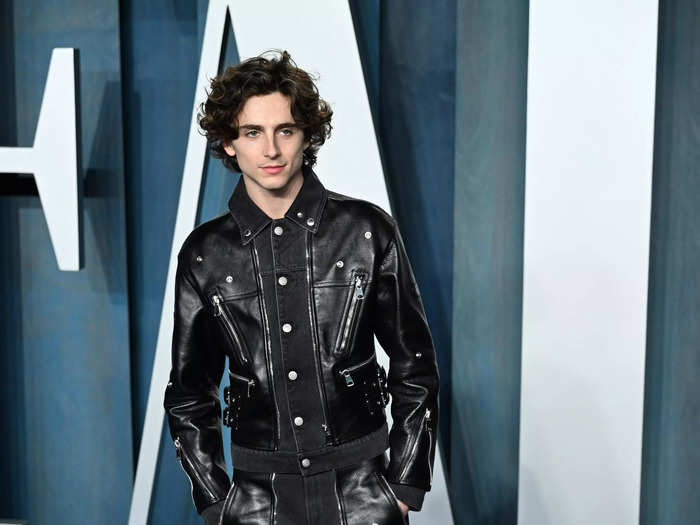 At the Vanity Fair Oscar Party later that evening, he changed into the leather and denim ensemble.