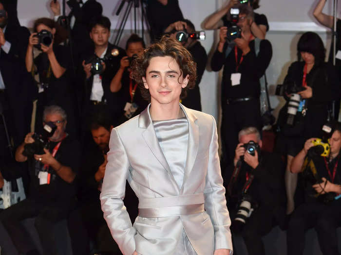 He wore another metallic silver look, this time with a silver belt, cuffed pants, and a boat-neck silk panel at the Venice Film Festival premiere of "The King" in September 2019.