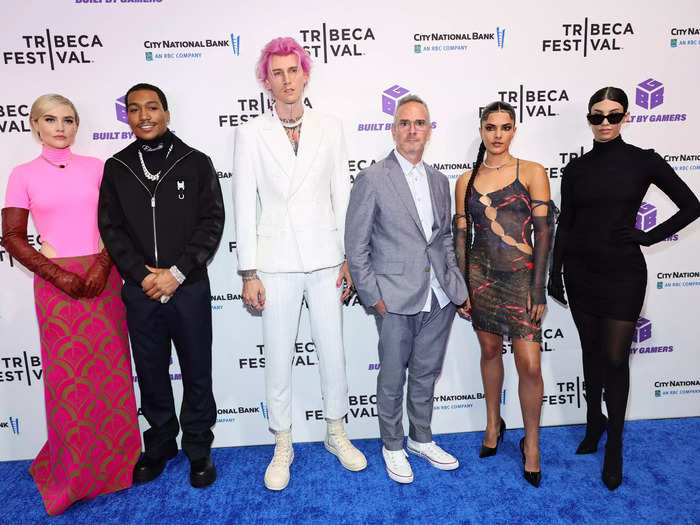 The cast posed for a photo together on the red carpet.