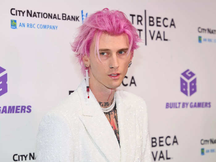 Machine Gun Kelly also wore a syringe earring on the red carpet, which was filled with a red liquid.