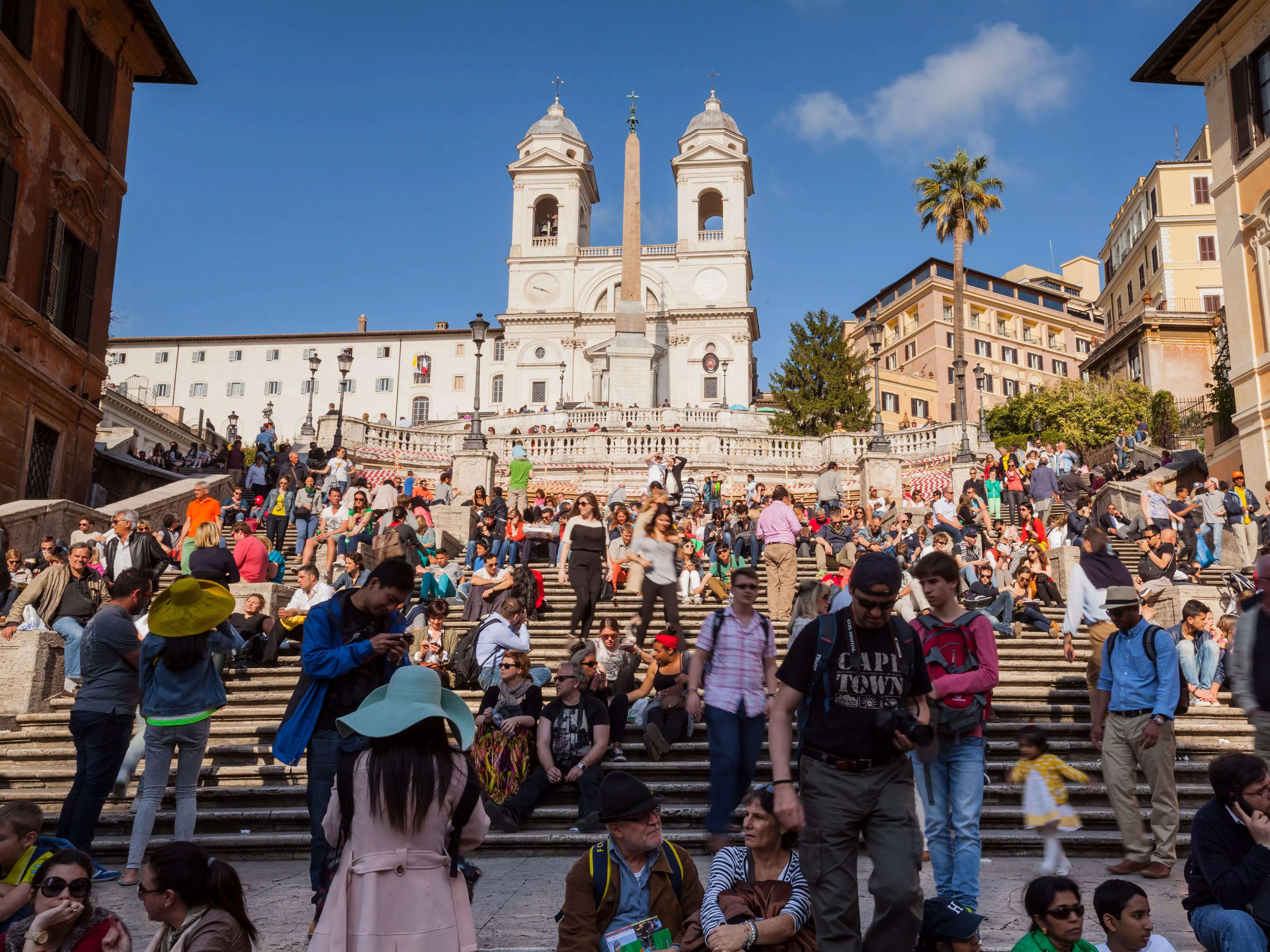 The Spanish Steps in Rome. They were built in 1725 and a popular tourist attraction. The church of Chiesa della Trinita dei Monti sits at the top.