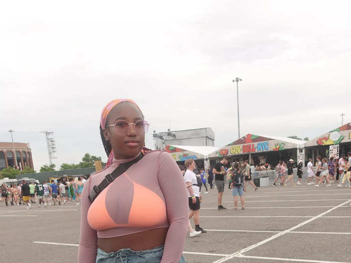 This fan looked great in a sheer, taupe top paired with an orange bralette and jeans.