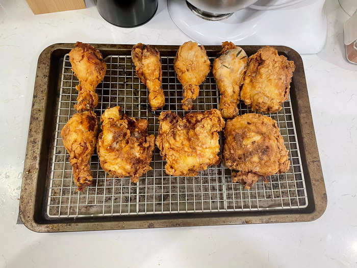 Add the fried chicken to a rack and let rest for 10 minutes.