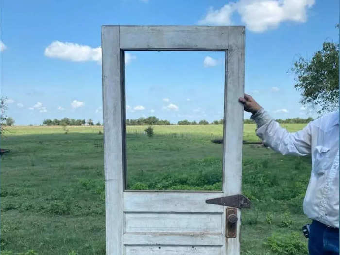 They even repurposed an old barn door as the front door of their new home.