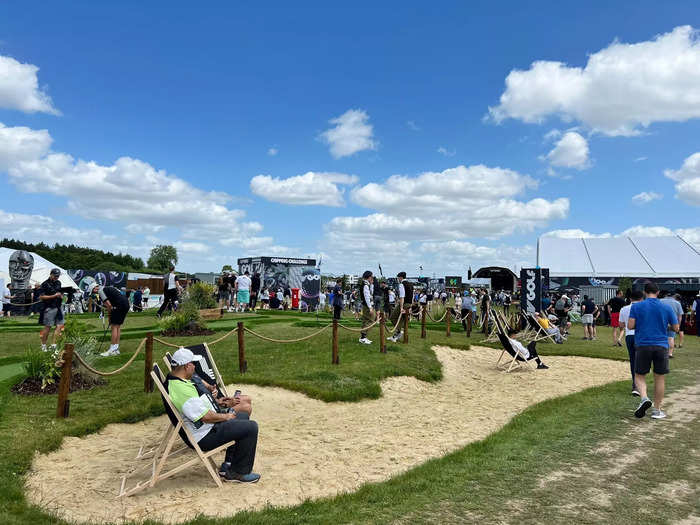 The area is evidently used as a practice ground most of the time, with deck chairs whimsically set up in bunkers for weary guests to rest their legs.