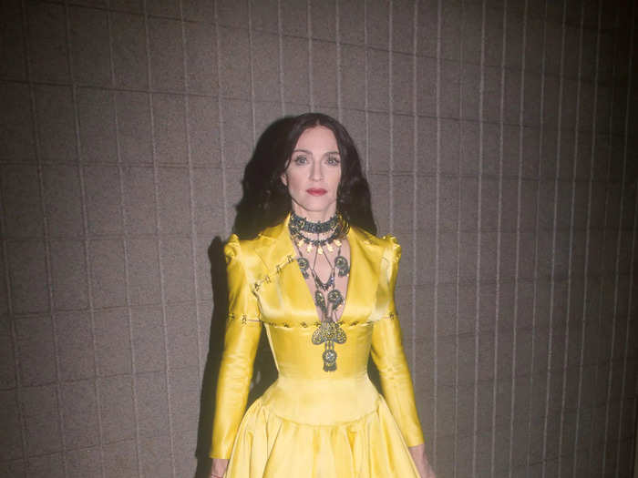 Madonna brought the drama to the 1998 VH1 Vogue Fashion Awards by wearing this vampy, yellow corseted gown.