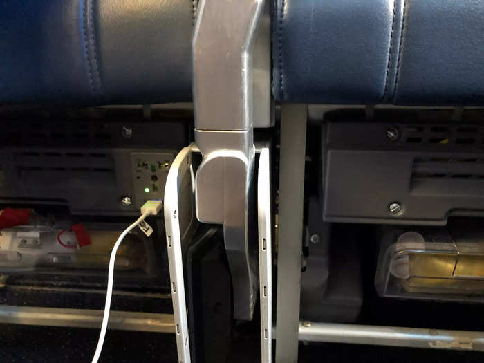 My seatmate had trouble locating his under-seat power outlet, so he had to ask a flight attendant. It made me miss the convenient plug placement in the A321neo