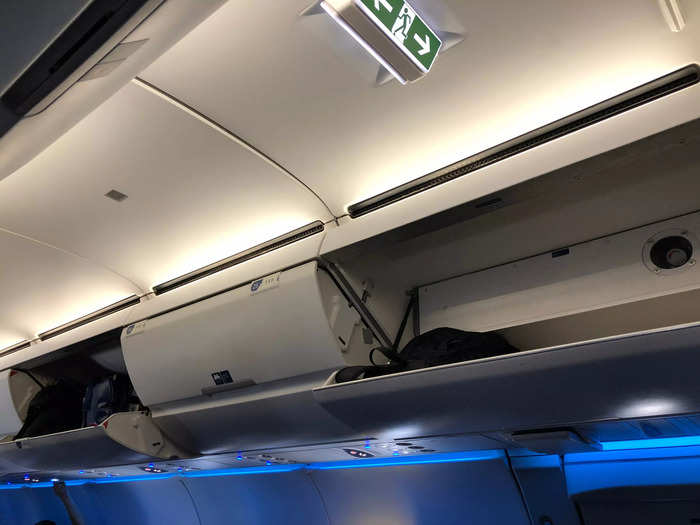 I immediately missed the artistic lighting and the roomier overhead bins, though this plane