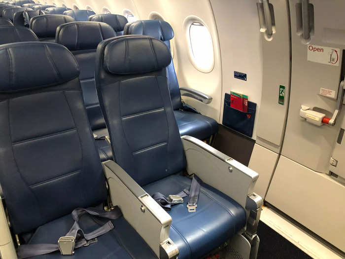 I was fortunate to score an exit row and bulkhead seat, 26A, on my sold-out flight from Boston to Atlanta. That position gave me plenty of extra leg room.