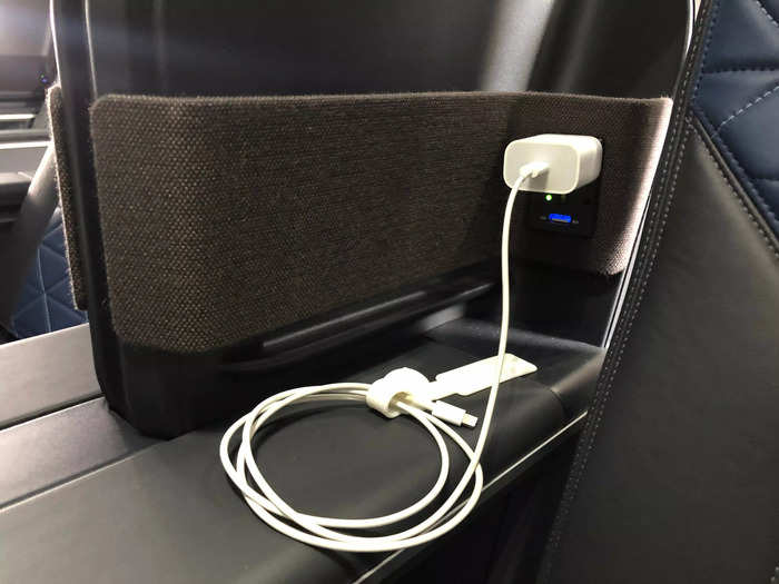 Each first-class seat aboard the new A321neo has two USB-A outlets and a universal power outlet plus a built-in mobile device holder so passengers can charge their devices without concern that they might be misplaced.