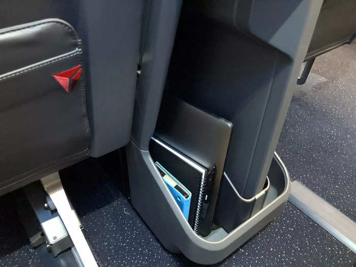 Each of the redesigned first-class seats comes with a roomy floor cubby that