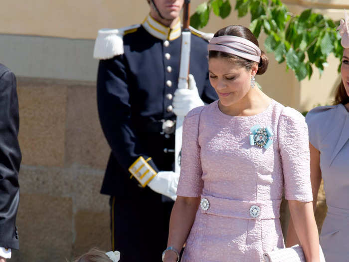 Crown Princess Victoria of Sweden wore the dress with a headband and brooch later the same month.
