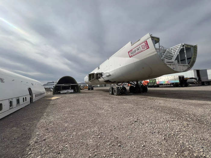 However, the plane is not yet it in true form. Specifically, the front and aft passenger sections have been disassembled, leaving the plane in three main pieces.