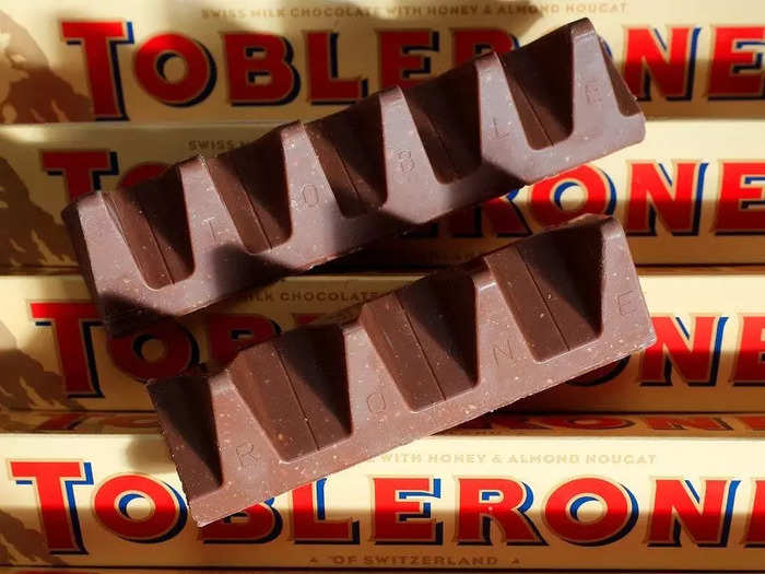 Mondelez also owns Swiss chocolate company Toblerone, which makes distinctively triangular chocolate bars. In 2014 it reduced the weight of its bars by 25% by adding more space between each piece – but reversed the decision two years later after public outcry.