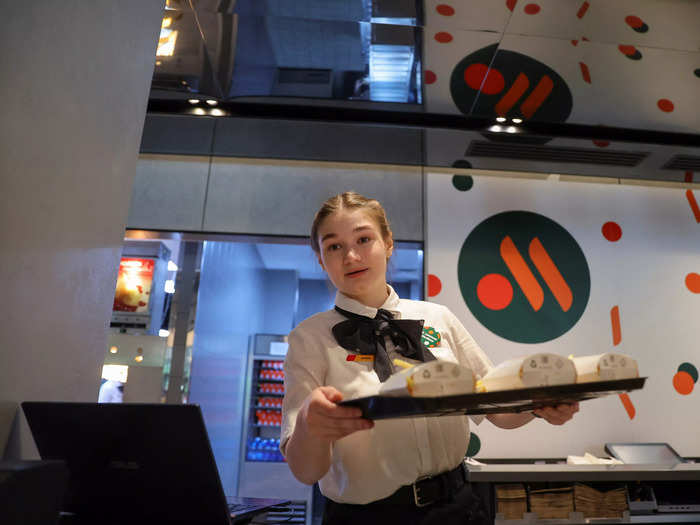 Staff rushed to get food out to scores of hungry customers.