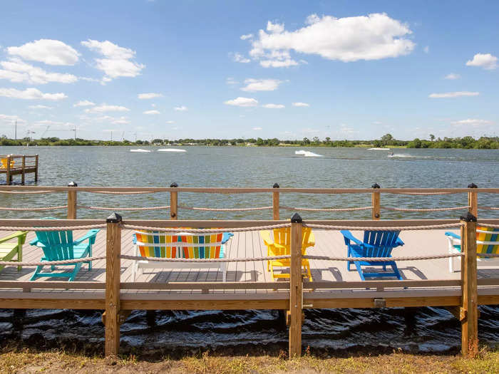 Outside of the RV sites and cabins, there are several pockets of leisure activities, including a basketball court, pool with a boardwalk over the lake …