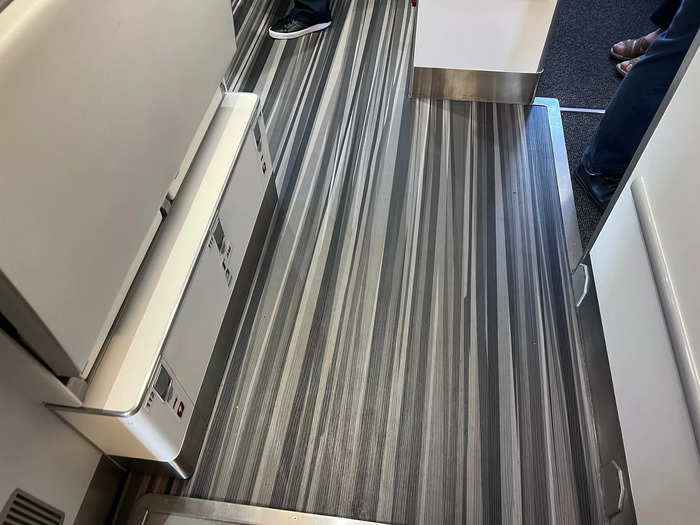 My flight to San Francisco was on the initial configuration. Walking on, I immediately noticed the elegant flooring design at the entrance and the jet even had that new plane smell.