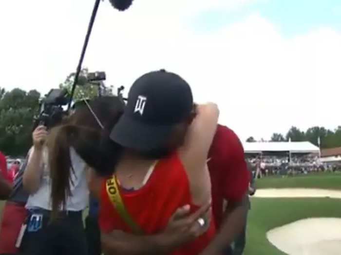 And she was at the Tour Championship and greeted Tiger after his win.