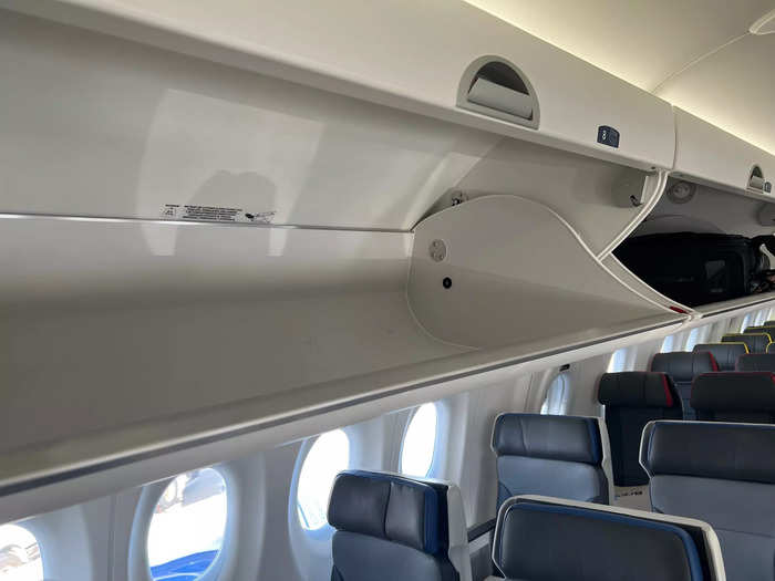 There is also one lavatory in the front of the plane, as well as large overhead bins throughout the aircraft.