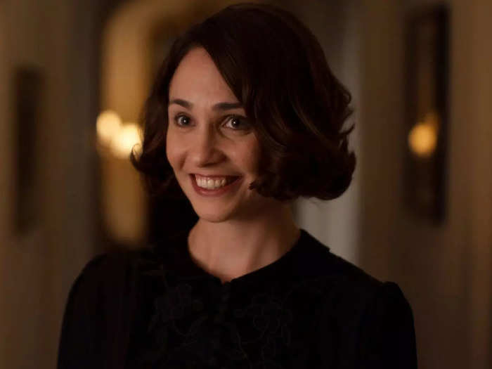 Lucy Branson (née Smith) is the maid who turned out to be the secret child of a distant Crawley relative. She wears a dark wig with turned out corners that give it a little flip.