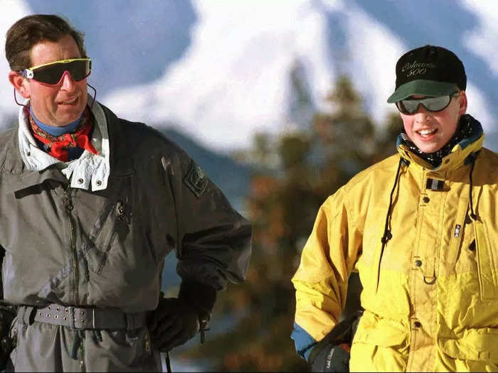 1996: Charles and Diana divorced when William was 14 years old. When not at Eton, William would split his time between his parents, going on regular vacations with both of them. Here he is with Charles on a skiing trip.