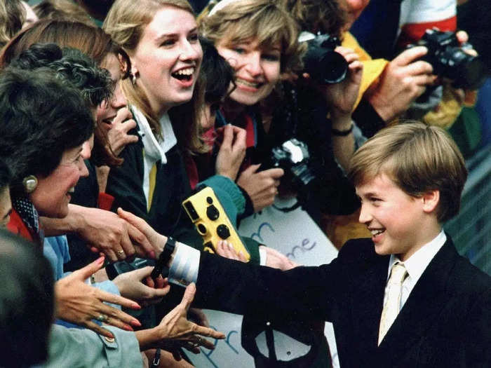1991: At just 9 years old, the young prince was already a hit with royal family fans. This photo was taken outside St. James Cathedral during a trip to Toronto, Canada.