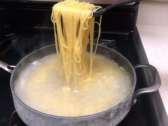 Once the tomato mixture was ready, Anneta started cooking her angel hair pasta.