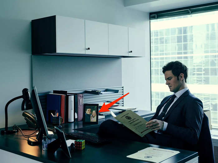 Hughie has a framed photo of Annie on his desk at the Federal Bureau of Superhuman Affairs (FBSA).