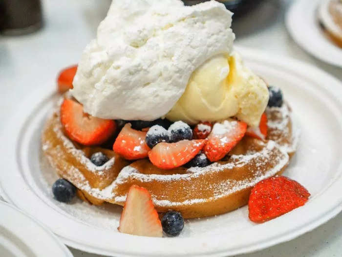 To "waffle" means to talk at length while not getting to the point.