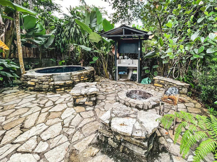 Fortunately, there was a spacious outdoor area that had a campfire, a dipping pool, and a sink. There was also a basketball court, where some local boys were playing.