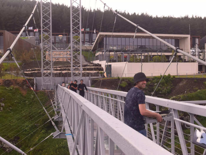 "In the beginning, I was a little scared but after you walk on it, it can feel very safe," one visitor, not pictured here, told Reuters. "And the view is amazing. It