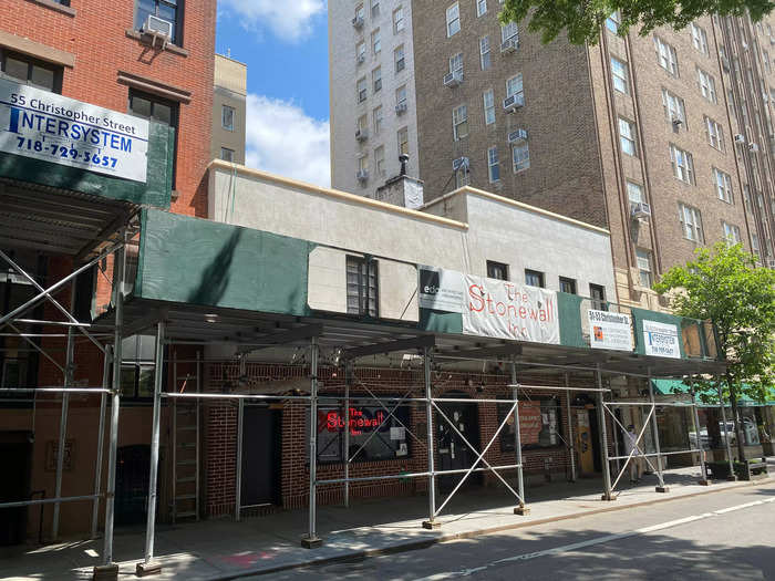 The Stonewall Inn is currently covered in scaffolding but it still operates as a bar and landmark today.