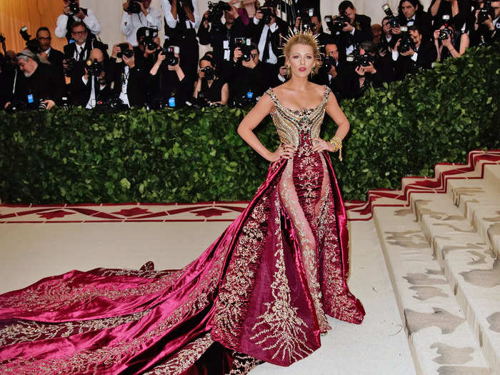 Lively was one of the best-dressed stars at the 2018 Met Gala in another Atelier Versace dress that had sheer thigh-high slits on both legs.