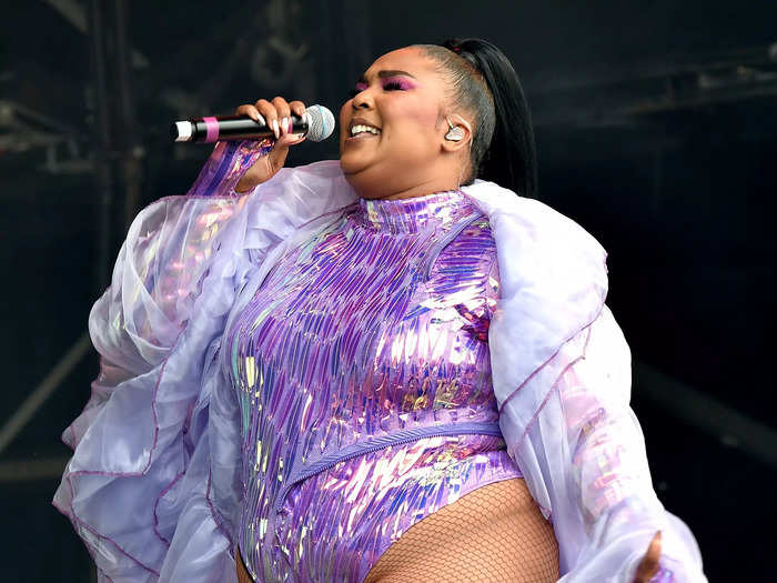 Lizzo wore an iridescent purple leotard with a giant tulle cape for her Glastonbury debut in 2019.