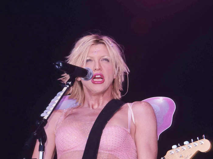 Courtney Love performed at the 1999 Glastonbury Festival wearing a sheer sparkly pink outfit with fairy wings.