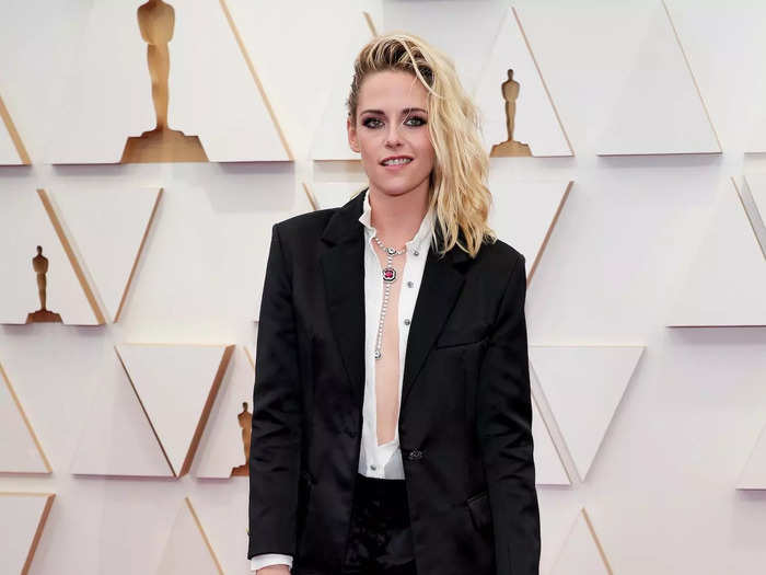 Best-actress nominee Kristen Stewart attended the 2022 Oscars in a pair of shorts and a completely-open white shirt.