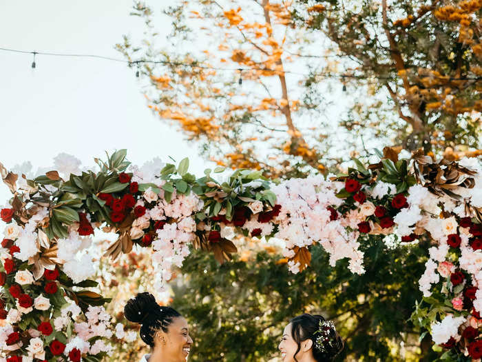 This couple popped in their pictures thanks to their bright outfits.